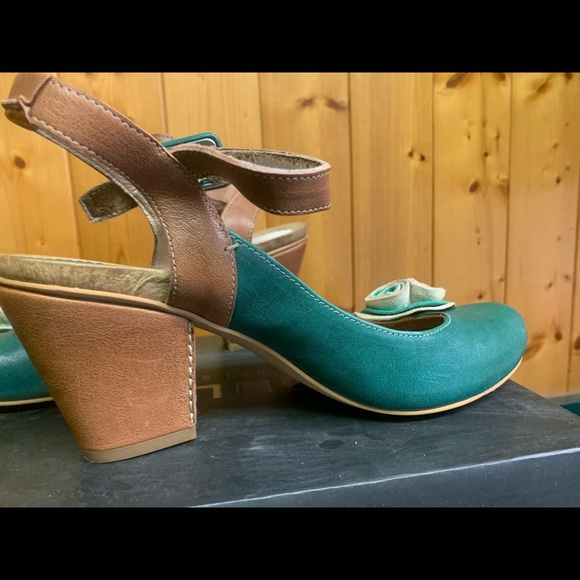 Chocolate leather shoes (one with puppy damage). - Picture 2 of 5